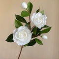 Single-stem artificial gardenia flower—decorative floral accent for dining tables, living rooms, bedrooms, and home interiors.